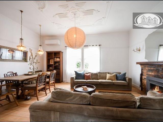 CENTRALLY LOCATED TASTEFULLY RENOVATED 4 BEDROOM HOME