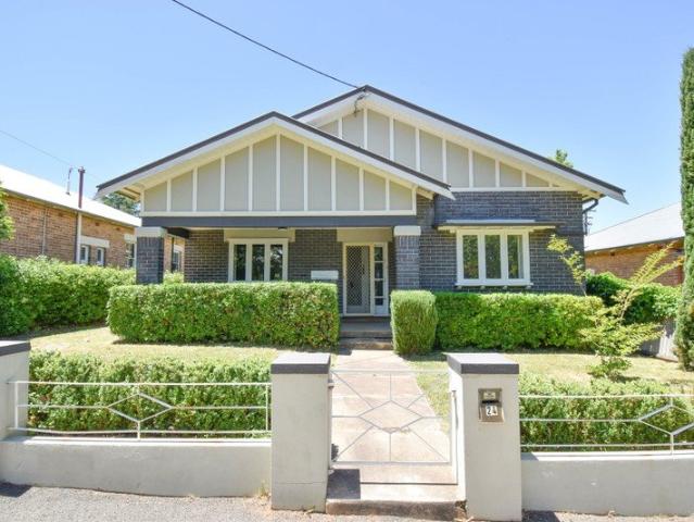 Centrally Located Timeless Beauty!