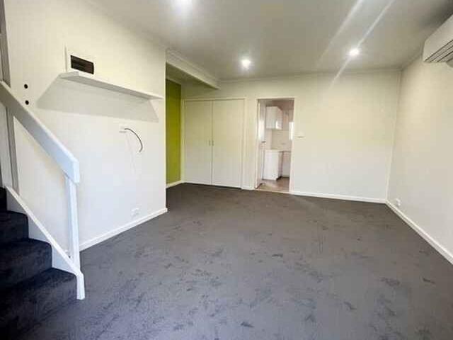 Centrally located townhouse with large deck