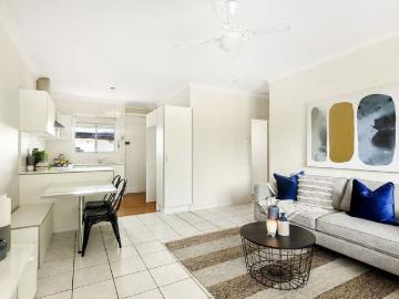 Centrally Located Upstairs Two Bedroom Unit!