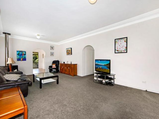 CENTRALLY LOCATED FAMILY HOME WITH LARGE YARD