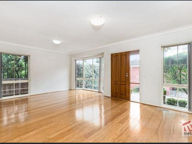 CENTRALLY LOCATED, FOUR BEDROOM TOWNHOUSE!