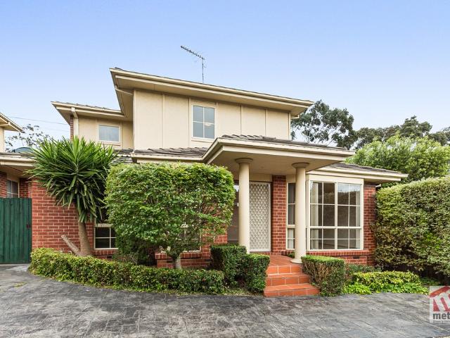 CENTRALLY LOCATED, FOUR BEDROOM TOWNHOUSE!
