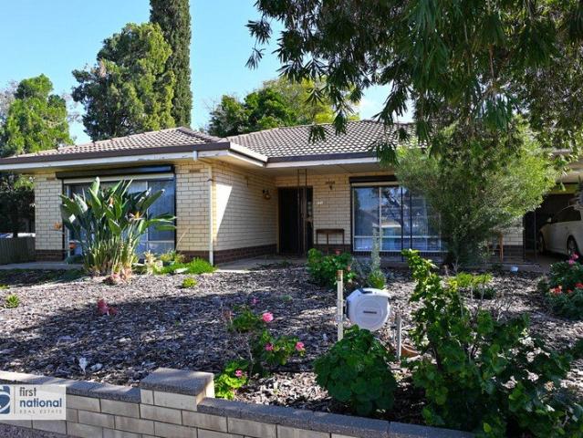 CENTRALLY LOCATED HOME WITH GREAT POTENTIAL