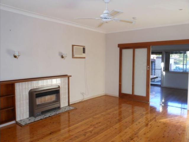 Centrally Located! Suit Family or Professional Offices!