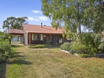 Cedar Charm on Half an Acre Room to breathe. Room to grow. Room to stay