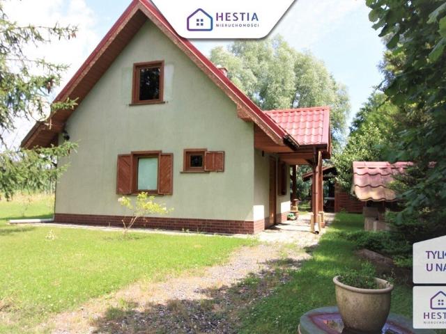 Domek z dostępem do jeziora, pomostem i dużą działką