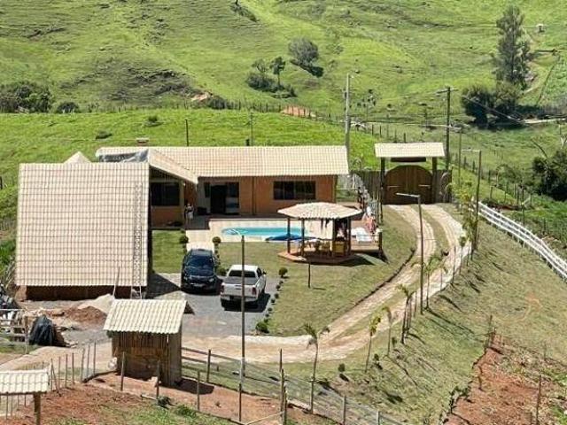 Chácara com 2 dormitórios à venda, 15500 m² por R$ 1.250.000,00 Biguá Delfim Moreira/MG