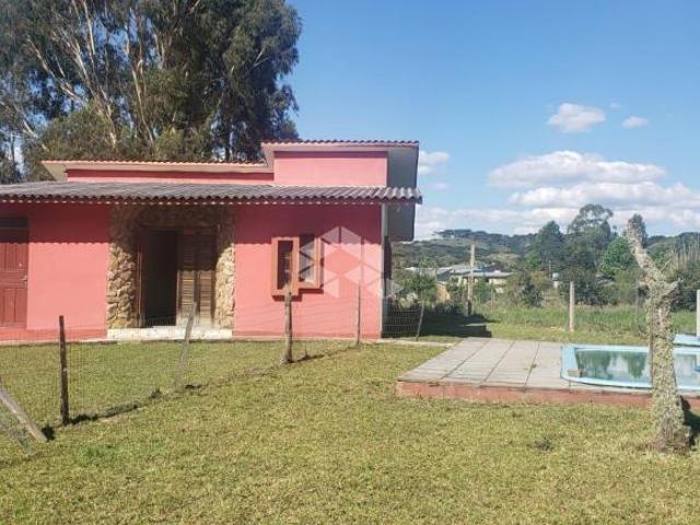 Chácara em condomínio com casa e piscina próximo à Caxias do Sul