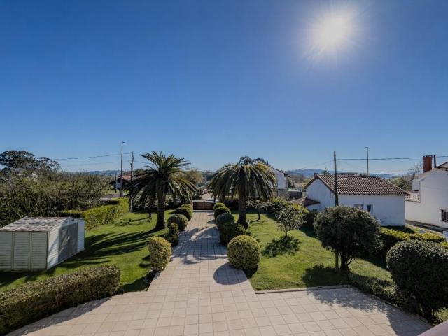 CHALET EN HINOJEDO, SUANCES CON DOS VIVIENDAS Y GRAN PARCELA