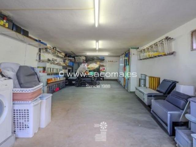 Chalet adosado con terraza y garaje