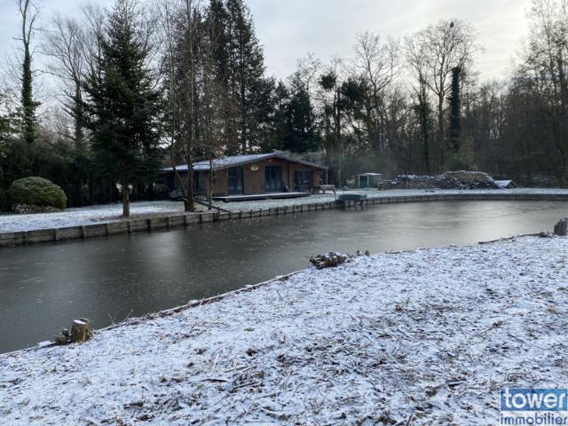 Chalet au coeur d'un cadre unique entre étang et rivière