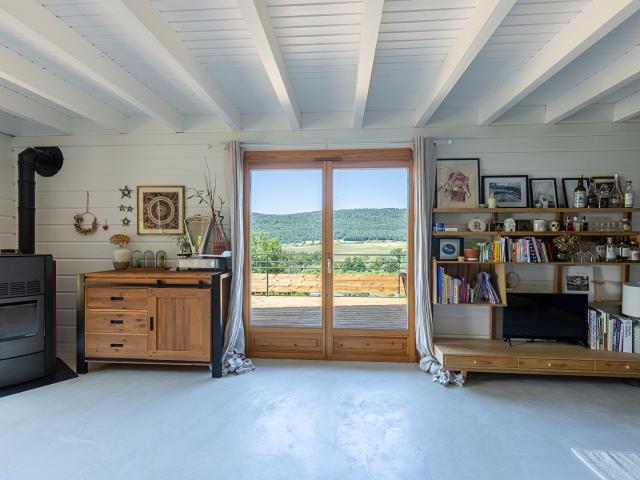Chalet avec terrasse et panorama sur la nature