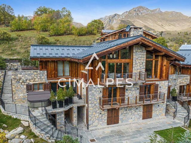 Chalet d'exception, volumes généreux et espace bien être. 325m² Les Belleville
