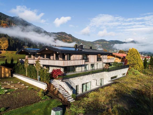 Chalet Duo der Extraklasse mit Kaiserblick in Reith Alpenpanorama direkt am Griesbach!