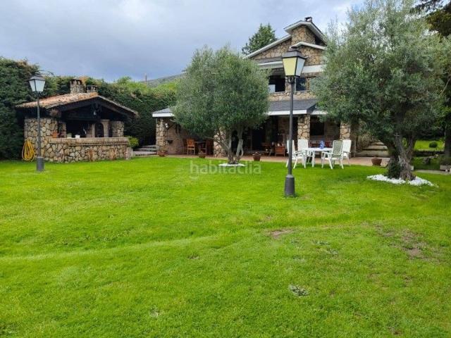 Chalet en venta en Bustarviejo. Casa unifamiliar en venta en El Pornoso Madrid. Chalets.