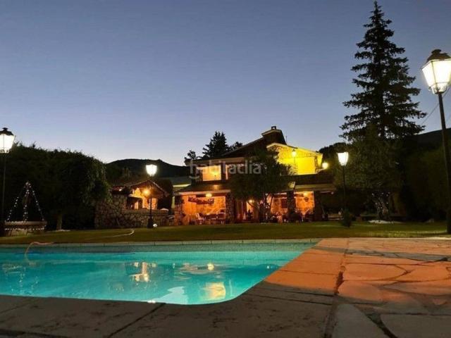 Chalet en venta en Bustarviejo. Casa unifamiliar en venta en El Pornoso Madrid. Chalets.