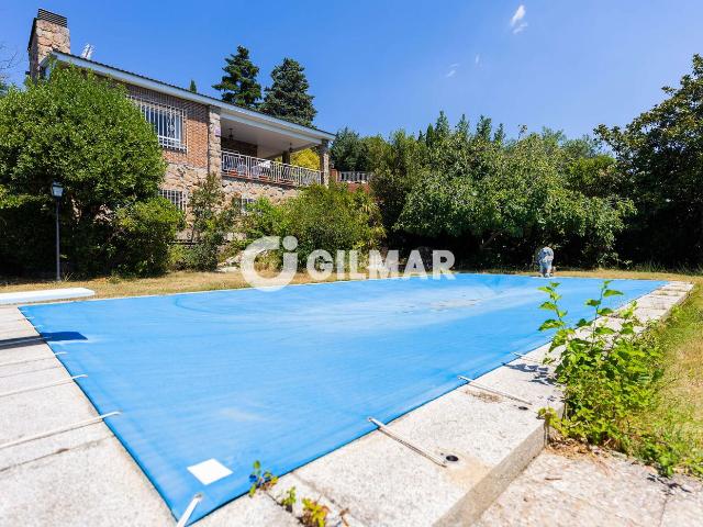 Chalet en venta en Hoyo de Manzanares. Exclusivo Chalet Independiente en Hoyo de Manzanares Situado en el tranquilo y privilegiado entorno de Hoyo de Manzanares, este c. Chalets Hoyo de.
