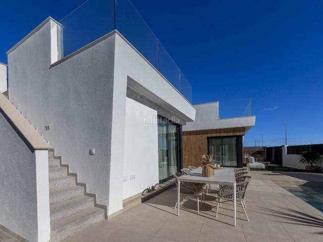 Chalet en venta en Murcia, Baños y Mendigo. Villa de obra nueva con piscina privada en Altaona Golf Resort. Chalets.