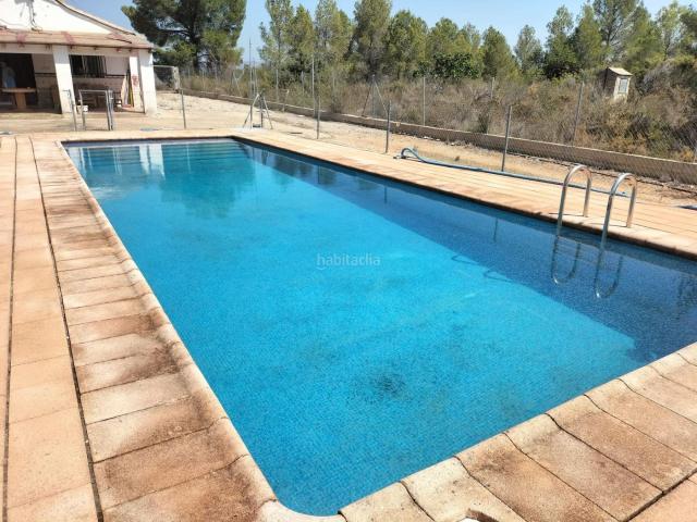 Chalet en venta en Navarrés. CHALET CON MAGNIFICAS VISTAS, PISCINA, BARBACOA, GARAJE, LUZ ELÉCTRICA Y AGUA POTABLE EN NAVARRES. Chalets.
