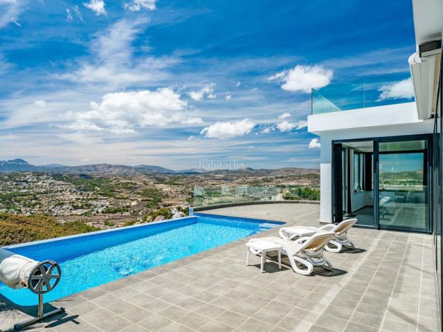 Chalet en venta en Poble Nou de Benitatxell el, Cumbre del Sol. Chalet moderno con piscina infinita y vistas al mar en Benitachell. Chalets Poble Nou de Benitatxell.