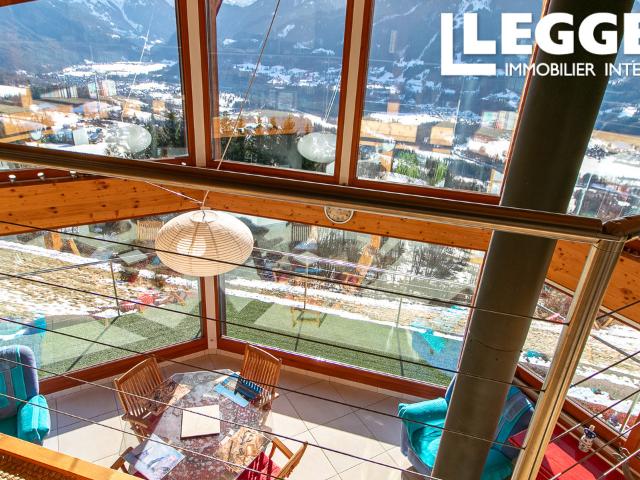 Chalet moderne avec vue imprenable sur les montagnes, divisé en 3 appartements séparés donnant sur Samoëns