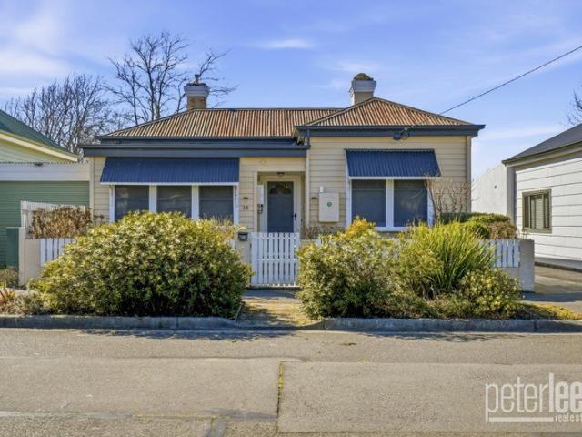 Character, Comfort & a Sun Filled Backyard