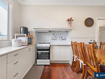 Character, Convenience & Low Maintenance Living with No Strata Fees