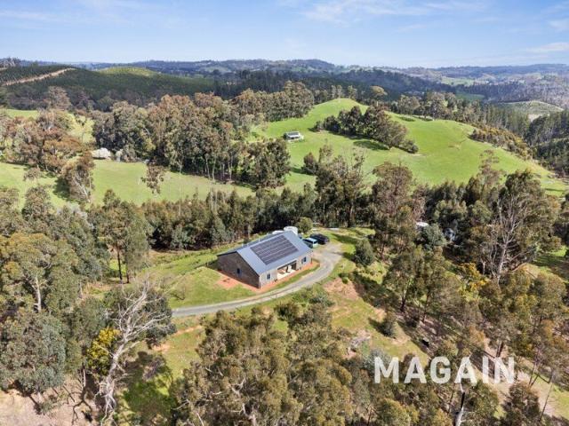 Character, charm and country views across 10 acres