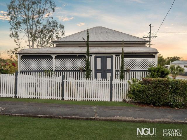 CHARACTER CHARM WITH A RENOVATED KITCHEN & BALCONY VIEWS