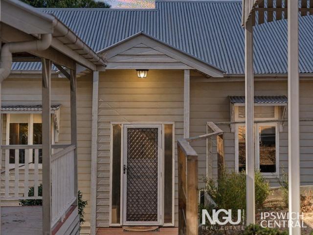 CHARACTER CHARM WITH PRIVATE LEAFY OUTDOOR LIVING!