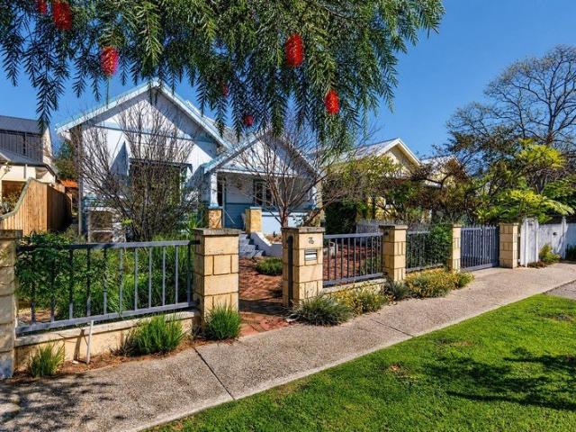 Character Filled North Facing Residence with Future Potential