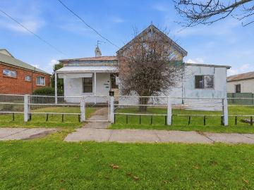 Character filled double brick home with renovation potential