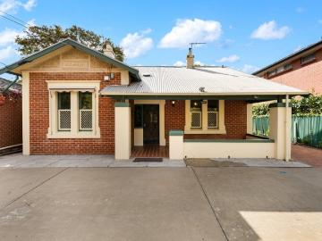 Character Filled Family Haven in Prestigious Walkerville!