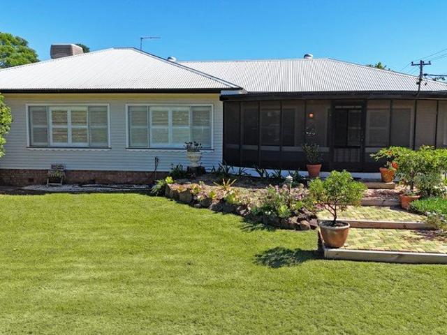 CHARACTER FILLED HOME IN A BLUE CHIP LOCATION