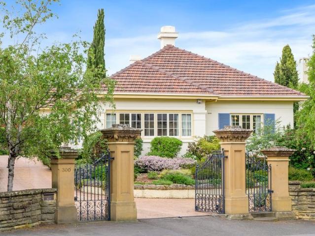 Character Filled Home in a Highly Sought After Sandy Bay Location