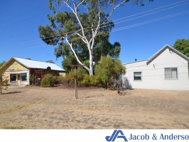Character Filled Home with Added Space & Potential