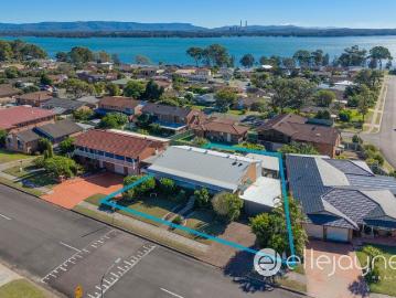 CHARACTER FILLED HOME WITH ELEVATED LAKE VIEWS & DUAL OCCUPANCY POTENTIAL BONNELLS BAY