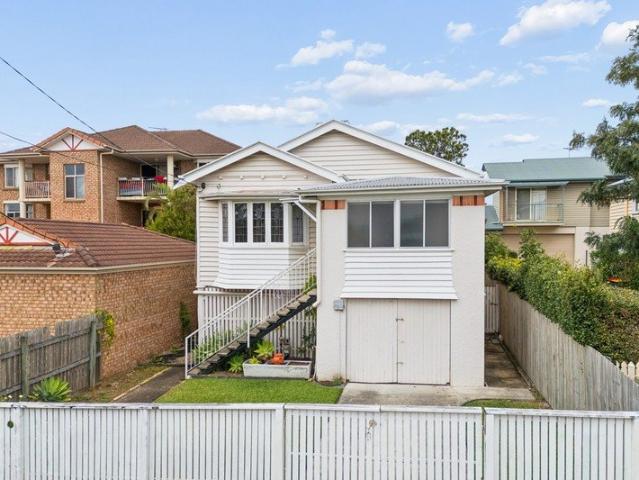 Character Filled Queenslander with City Glimpses