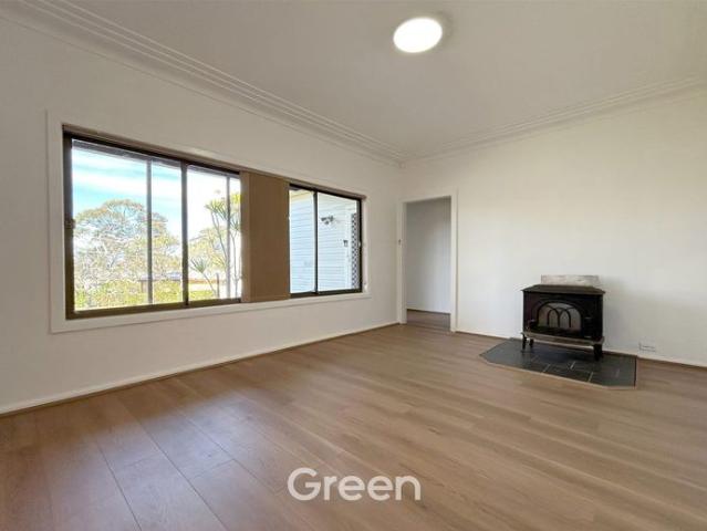 Character Filled Three Bedroom House with Practical Living and Elevated Outlook!