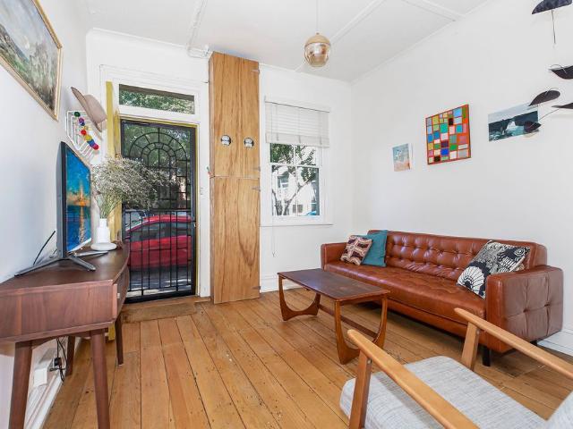 CHARACTER FILLED TOWNHOUSE IN THE HEART OF COOKS HILL