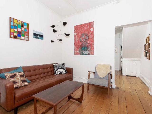 CHARACTER FILLED TOWNHOUSE IN THE HEART OF COOKS HILL