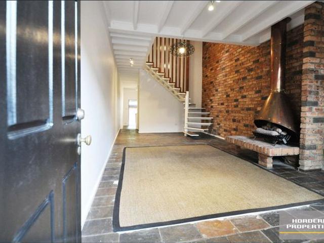 Character Filled Tri Level Terrace with Attic Retreat in Prime Glebe Location