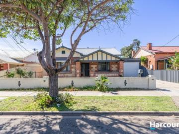 Character freestone fronted Bungalow, Circa 1925. Renovated throughout
