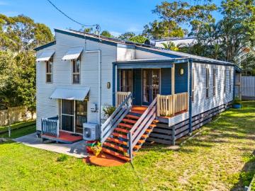 Character Home with Flexible Living Spaces in a Prime Elevated Location