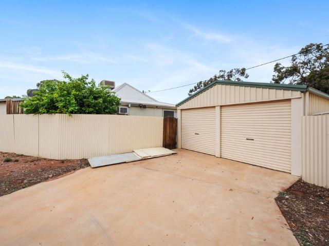 Character home with shed and separate games room!