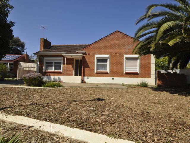 Character Home with Spacious Yard & Secure Parking