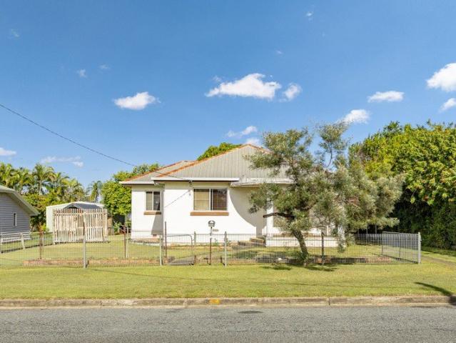 Character Home Packed with Potential in a Prime Location