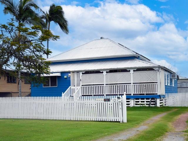 CharacterFilled Queenslander With Stunning Colourful Interiors & Modern Upgrades