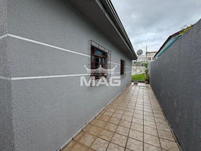Charmosa Casa com Amplo Terreno Pronta para Morar